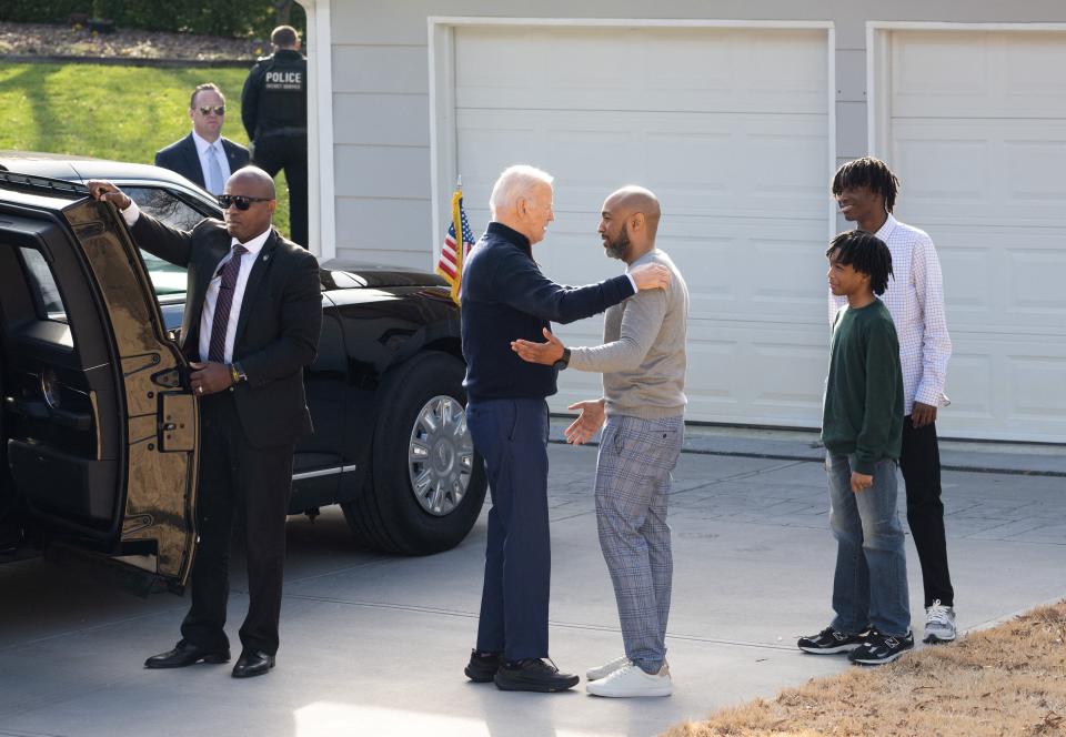 President Joe Biden greets a family for a conversation about student loan debt forgiveness at their home in Raleigh, North Carolina, January 18, 2024, after he touted his economic agenda in a speech at Abbotts Creek Community Center. (Photo by SAUL LOEB / AFP) (Photo by SAUL LOEB/AFP via Getty Images)