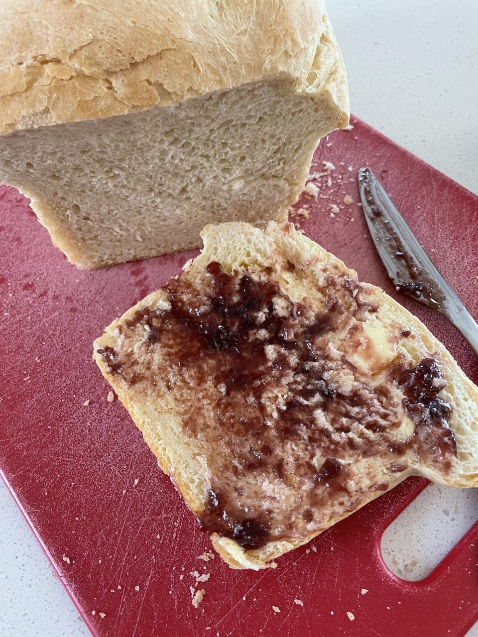 a slice of bread with butter and jam