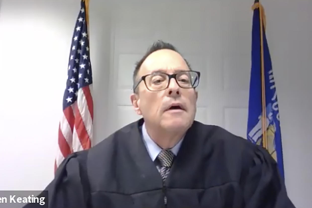 In this screengrab from a live stream video, Kenosha County Circuit Court Commissioner Loren Keating speaks during a hearing at Kenosha County Court in Kenosha, Wis., on Tuesday, Jan. 5, 2021, in the case of Kyle Rittenhouse. Rittenhouse, an Illinois teenager who fatally shot two people and wounded a third amidst sometimes violent summer protests on the streets of Kenosha, Wisconsin, pleaded not guilty on Tuesday to charges including intentional homicide. (Kenosha County Court via AP)