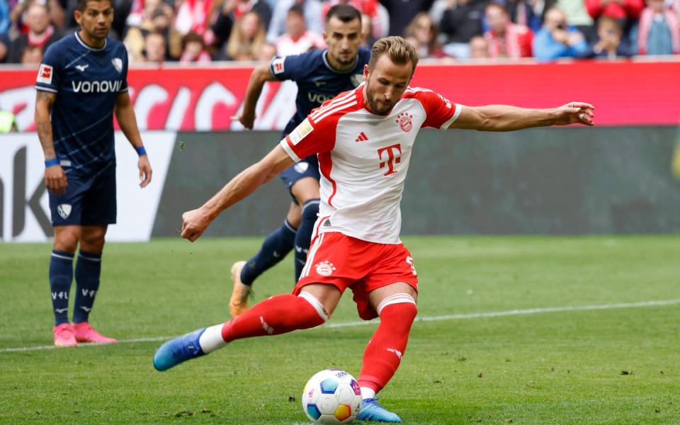 Harry Kane scores from the penalty spot against Bochum - Harry Kane scores first Bayern Munich hat-trick in Bochum thrashing