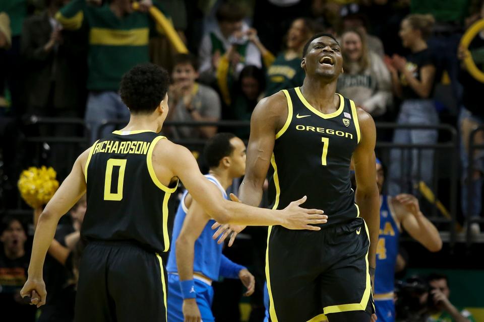 Oregon center N'Faly Dante celebrates during the first half as the Oregon Ducks host the No. 7 UCLA Bruins on Feb. 11 at Matthew Knight Arena in Eugene.