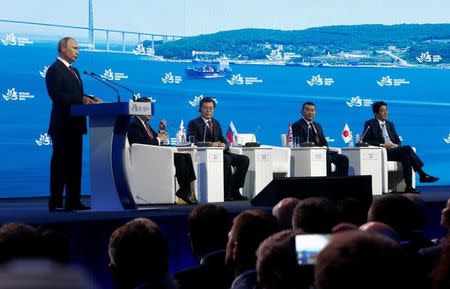 Russian President Vladimir Putin delivers a speech during a session of the Eastern Economic Forum in Vladivostok, Russia September 7, 2017. REUTERS/Sergei Karpukhin