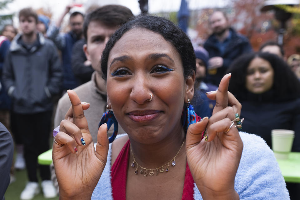 United States soccer team fan Dania Abdalla react as they watch on television at a bar in Washington the United States team play against the Netherlands during their World Cup soccer match, Saturday, Dec. 3, 2022. (AP Photo/Manuel Balce Ceneta)