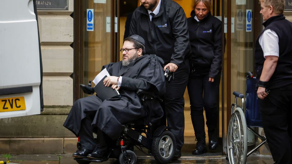 Nicholas Rossi leaves court in Edinburgh, Scotland, after his extradition hearing in June. He described himself as an Irish orphan who had never visited the US. - Jeff J Mitchell/Getty Images