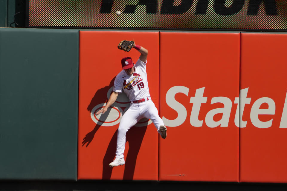 St. Louis Cardinals right fielder Tommy Edman is unable to catch a two-run home run by Kansas City Royals' Michael Massey during the ninth inning of a baseball game Monday, May 29, 2023, in St. Louis. (AP Photo/Jeff Roberson)