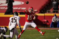 Kansas City Chiefs quarterback Patrick Mahomes throws a pass during the first half of an NFL football game against the Atlanta Falcons, Sunday, Dec. 27, 2020, in Kansas City. (AP Photo/Jeff Roberson)