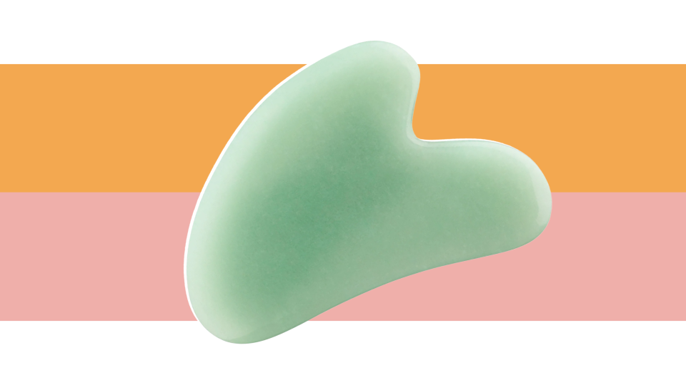 Massage the face with the Rena Chris gua sha tool.