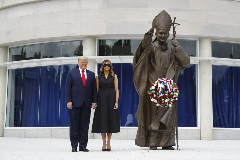 President Donald Trump and first lady Melania Trump visit St. John Paul II National Shrine on Tuesday in Washington. (Photo: Patrick Semansky/Associated Press)