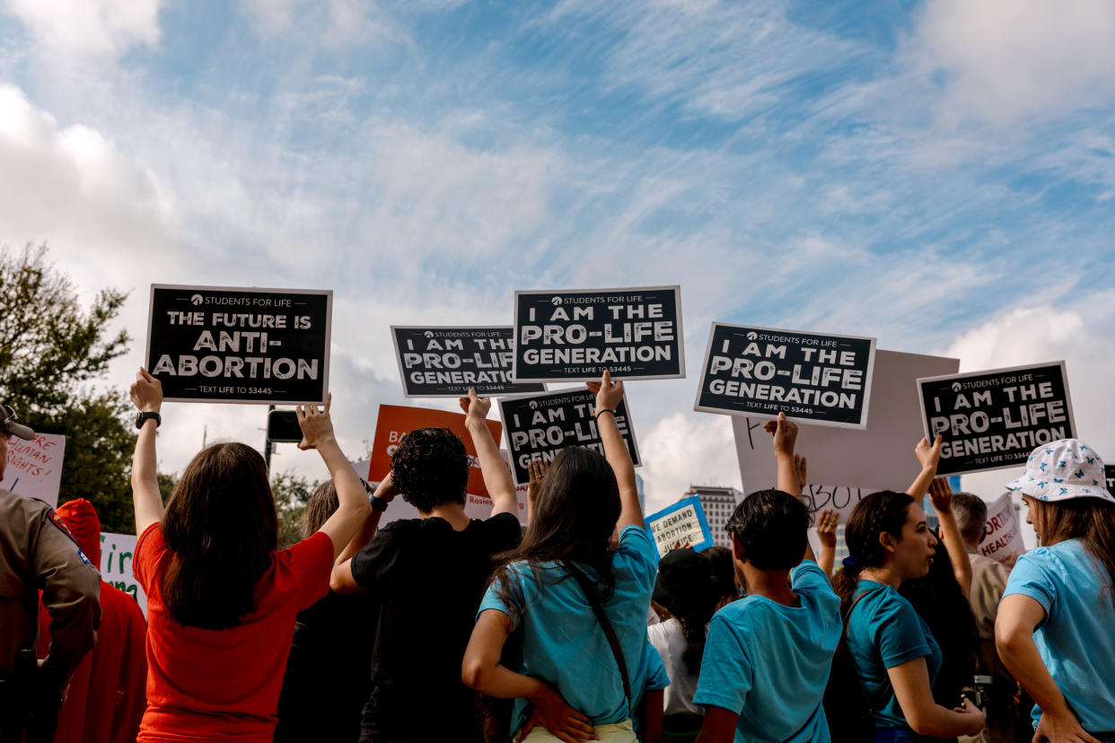 Demonstrators outside the Texas State Capitol during a Women's March in Austin, on Oct. 2, 2021.  (Sarah Karlan / Bloomberg via Getty Images file)