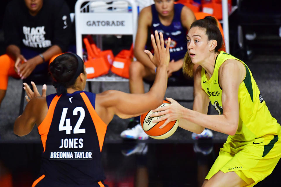 PALMETTO, FLORIDA - AUGUST 16: Breanna Stewart #30 of the Seattle Storm looks to shoot from beyond the three point line over Brionna Jones #42 of the Connecticut Sun during the first half of a game at Feld Entertainment Center on August 16, 2020 in Palmetto, Florida. NOTE TO USER: User expressly acknowledges and agrees that, by downloading and or using this photograph, User is consenting to the terms and conditions of the Getty Images License Agreement. (Photo by Julio Aguilar/Getty Images)