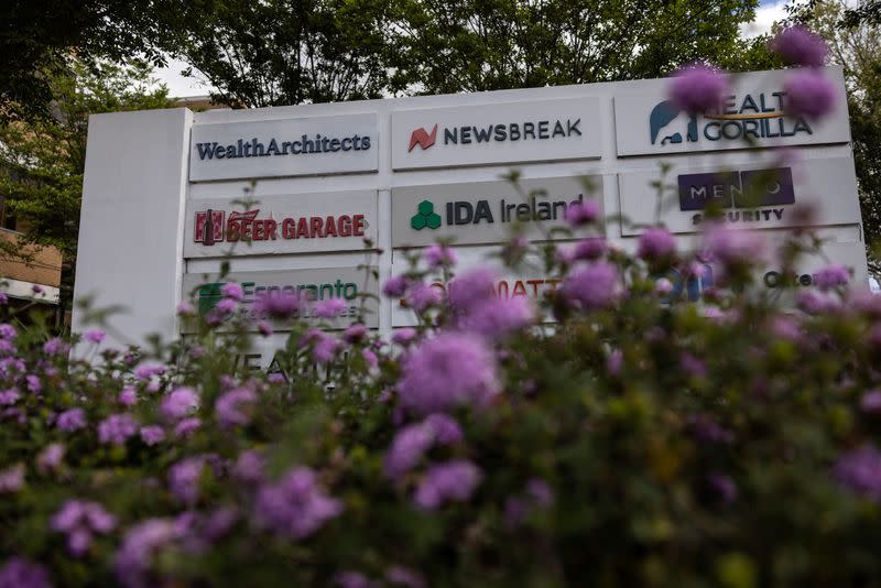 A Newsbreak company logo is displayed at a corporate office building in Mountain View, California