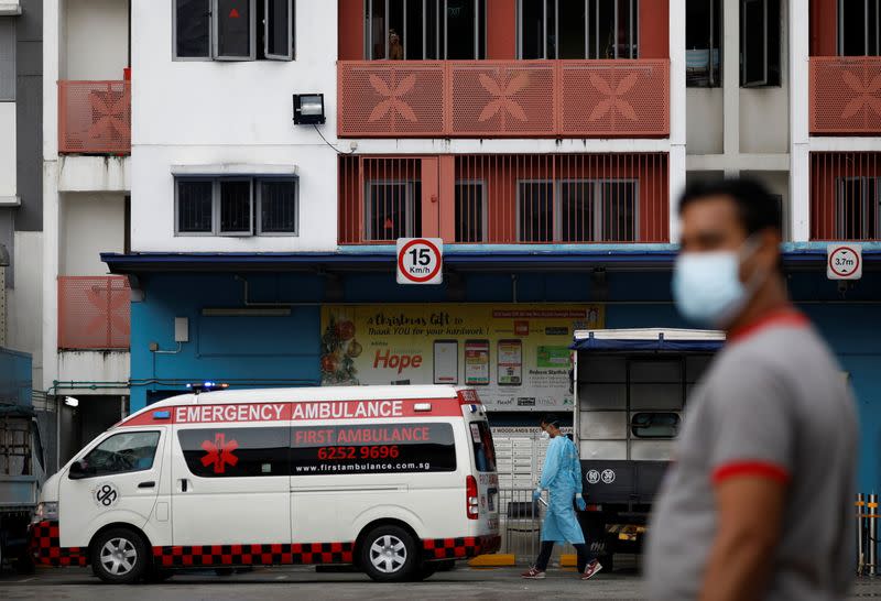 An ambulance arrives at Westlite Woodlands dormitory after workers were tested positive for the coronavirus disease (COVID-19) in Singapore