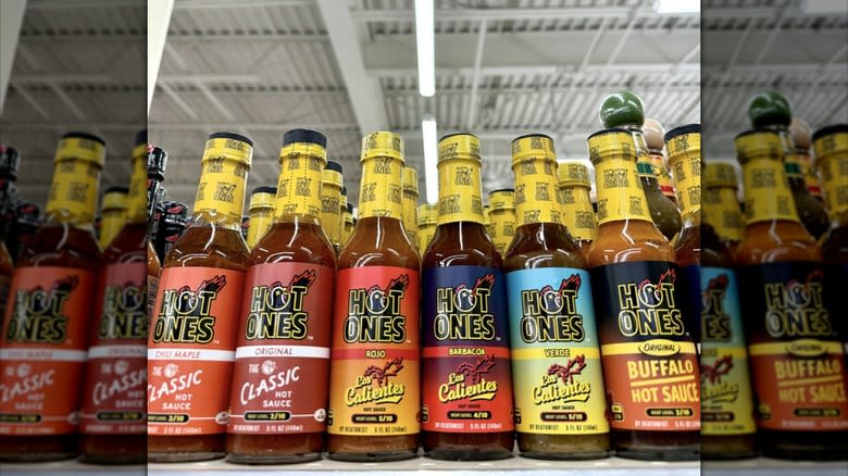 Hot Ones sauce bottles on shelf