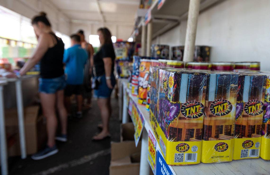 Legal fireworks await buyers at a Sacramento fireworks stand Tuesday. The fireworks may only be sold or used until July 4.