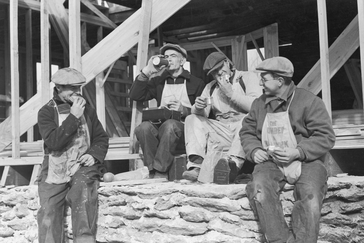 Workers having lunch Harold M. Lambert/Lambert/Getty Images