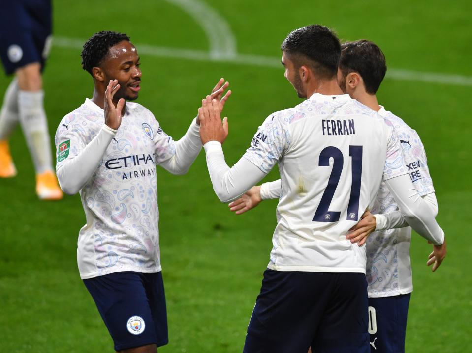 Goalscorers Raheem Sterling and Ferran Torres celebrateAP