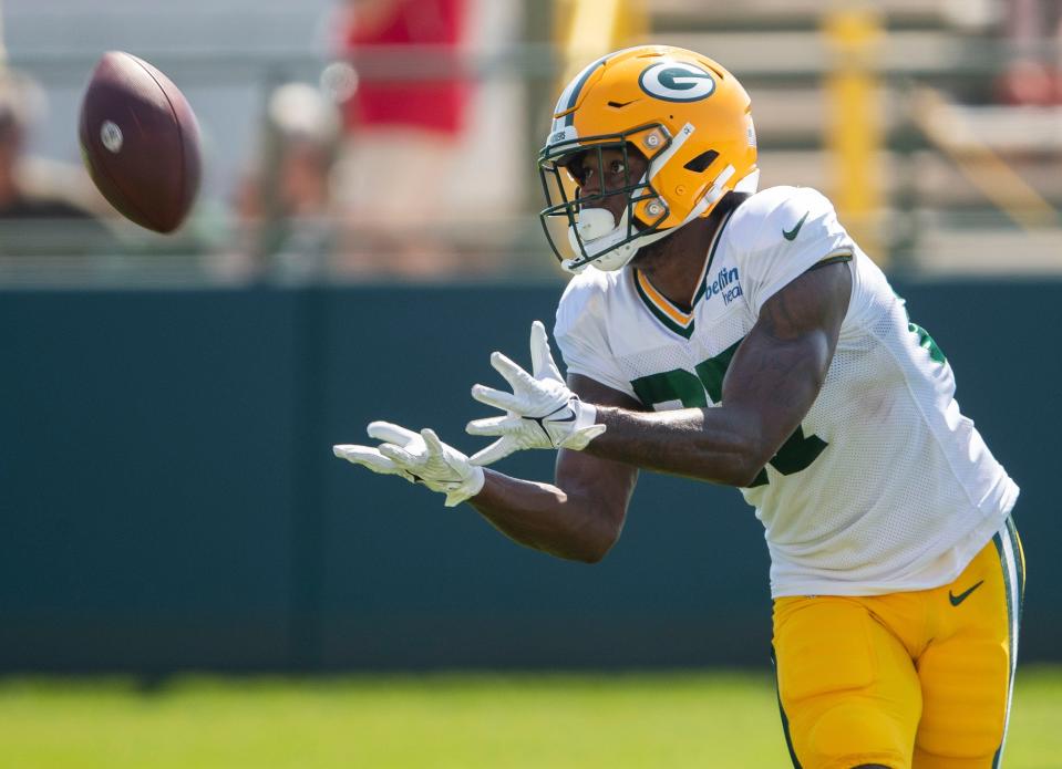 Green Bay Packers wide receiver <a class="link " href="https://sports.yahoo.com/nfl/players/34088" data-i13n="sec:content-canvas;subsec:anchor_text;elm:context_link" data-ylk="slk:Romeo Doubs;sec:content-canvas;subsec:anchor_text;elm:context_link;itc:0">Romeo Doubs</a> (87) catches a pass during practice on Thursday, August 3, 2023, at Ray Nitschke Field in Green Bay, Wis. Tork Mason/USA TODAY NETWORK-Wisconsin