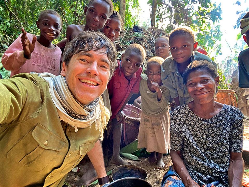 Simon Reeve with a remote Baka community in the Congo (BBC/The Garden/Simon Reeve)