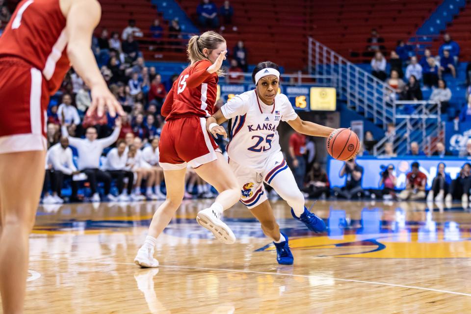 Kansas women's basketball guard Chandler Prater drives with the ball Thursday during a 2023 Postseason WNIT game against Nebraska inside Allen Fieldhouse.