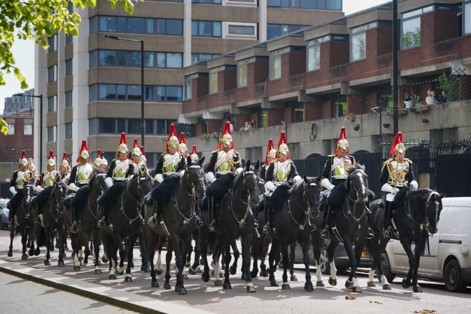 Members of the Household Cavalry leave Hyde Park Barracks before taking part in a parade for the Major General's annual inspection on Thursday morning (Jonathan Brady/PA Wire)
