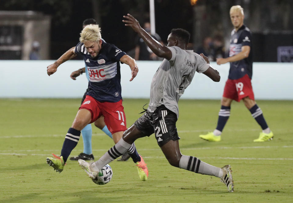 New England Revolution midfielder Kelyn Rowe, left, and Montreal Impact midfielder Victor Wanyama vie for the ball during the first half of an MLS soccer match Thursday, July 9, 2020, in Kissimmee, Fla. (AP Photo/John Raoux)