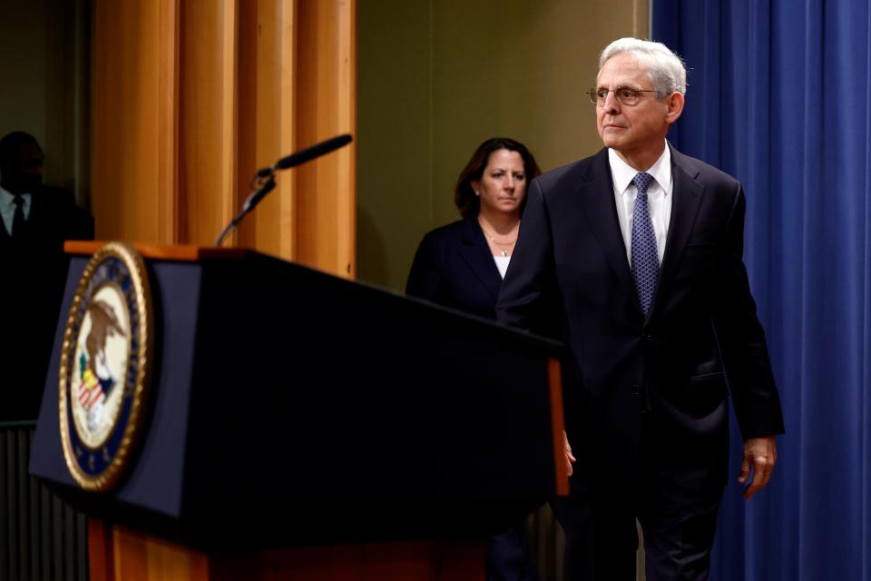 Attorney General Merrick Garland and Deputy Attorney General Lisa O. Monaco arrive to deliver remarks at the U.S. Justice Department on Friday in Washington, D.C.