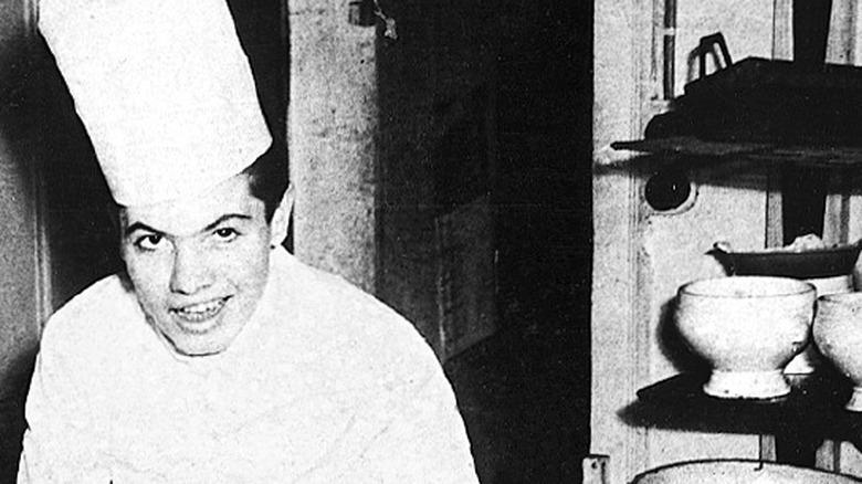 Young Jacques Pépin in kitchen