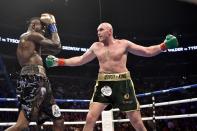 <p>Deontay Wilder and Tyson Fury exchange punches during their WBC Heavyweight Championship bout in Los Angeles. Fury twice was knocked down to the canvas, but twice rose again in a drawn contest (Lionel Hahn/PA). </p>