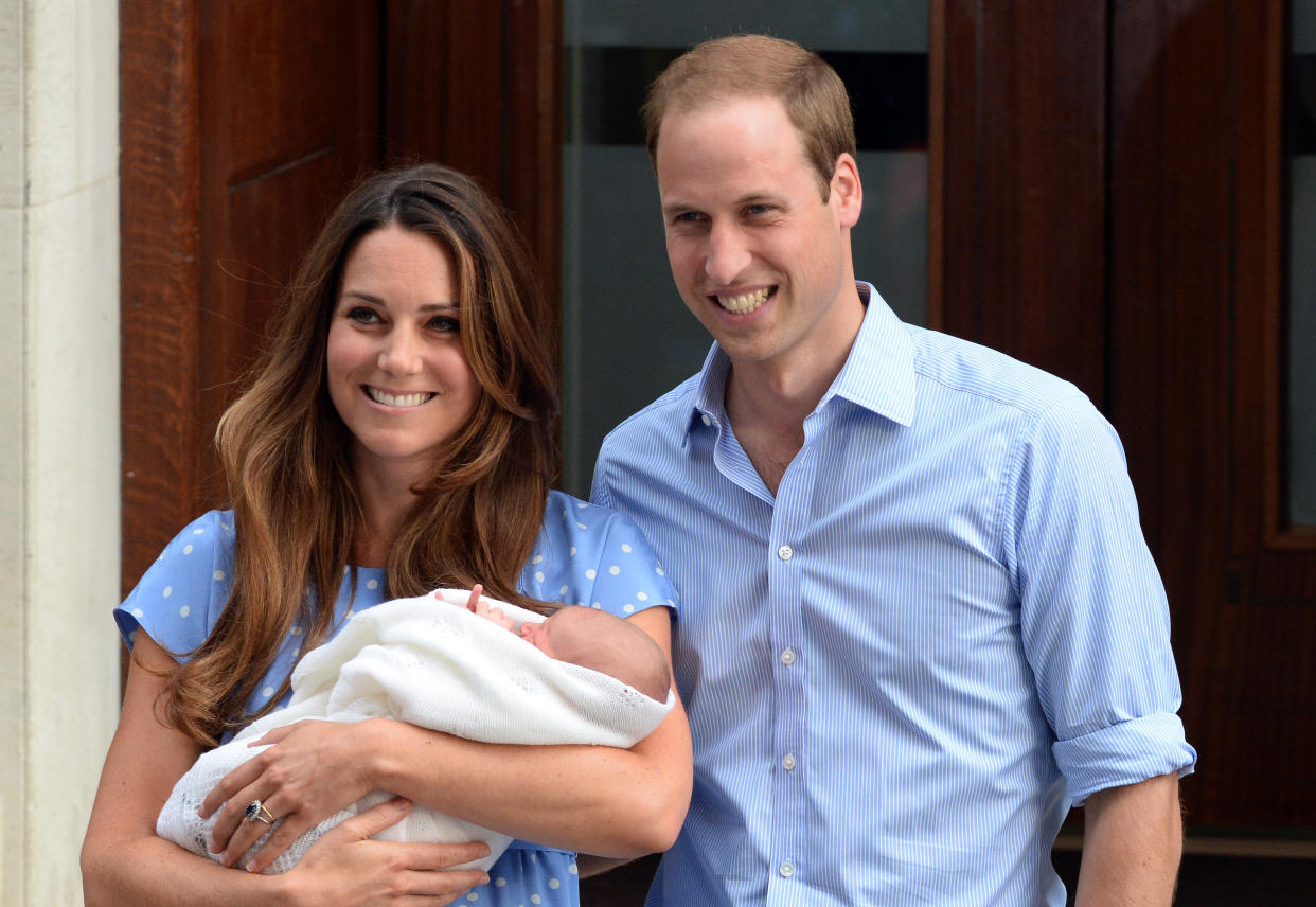 Prince William, Duke of Cambridge and Catherine, Duchess of Cambridge leave the Lindo Wing of St. Mary's hospital with their newborn baby son on July 23, 2013'