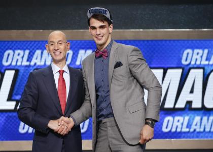 Dario Saric poses with NBA Commissioner Adam Silver. (AP/Jason DeCrow)