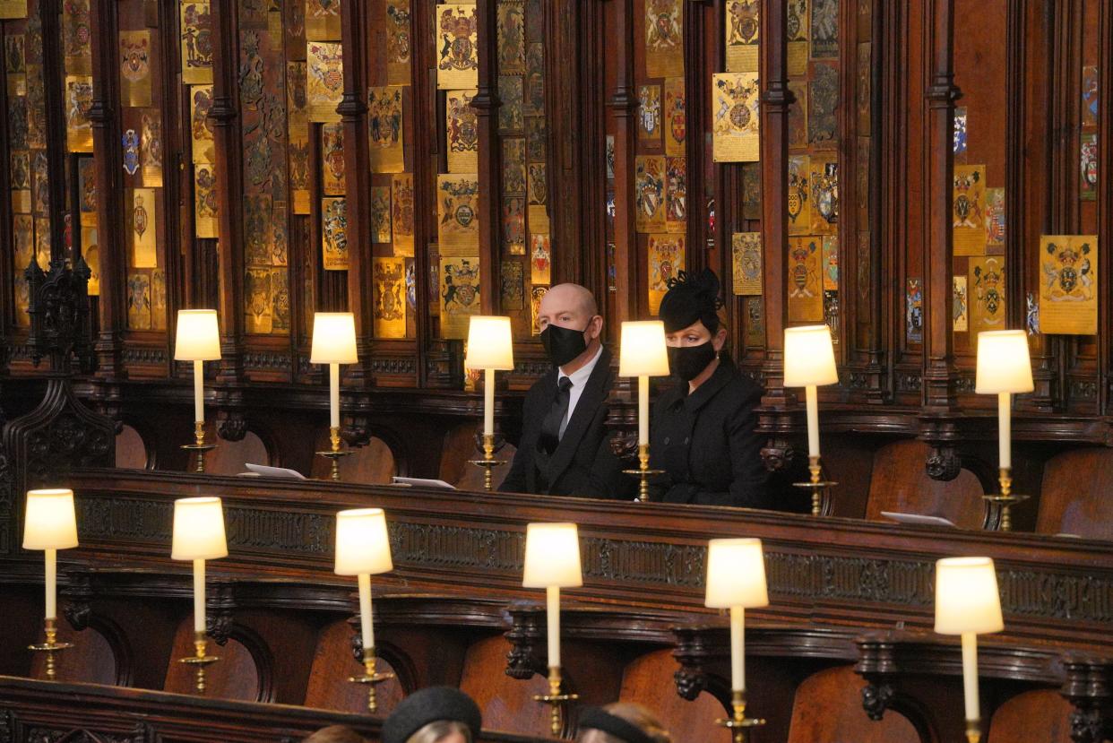 Mike Tindall and Zara Phillips attend the funeral service of Britain's Prince Philip, Duke of Edinburgh inside St George's Chapel in Windsor Castle in Windsor, west of London, on April 17, 2021. - Philip, who was married to Queen Elizabeth II for 73 years, died on April 9 aged 99 just weeks after a month-long stay in hospital for treatment to a heart condition and an infection. (Photo by Dominic Lipinski / POOL / AFP) (Photo by DOMINIC LIPINSKI/POOL/AFP via Getty Images)