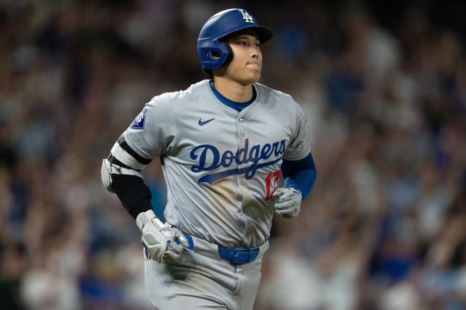 DENVER, COLORADO - SEPTEMBER 27: Shohei Ohtani #17 of the Los Angeles Dodgers watches the flight of the ball after a home run against the Colorado Rockies at Coors Field on September 27, 2024 in Denver Colorado. (Photo by Kyle Cooper/Colorado Rockies/Getty Images)