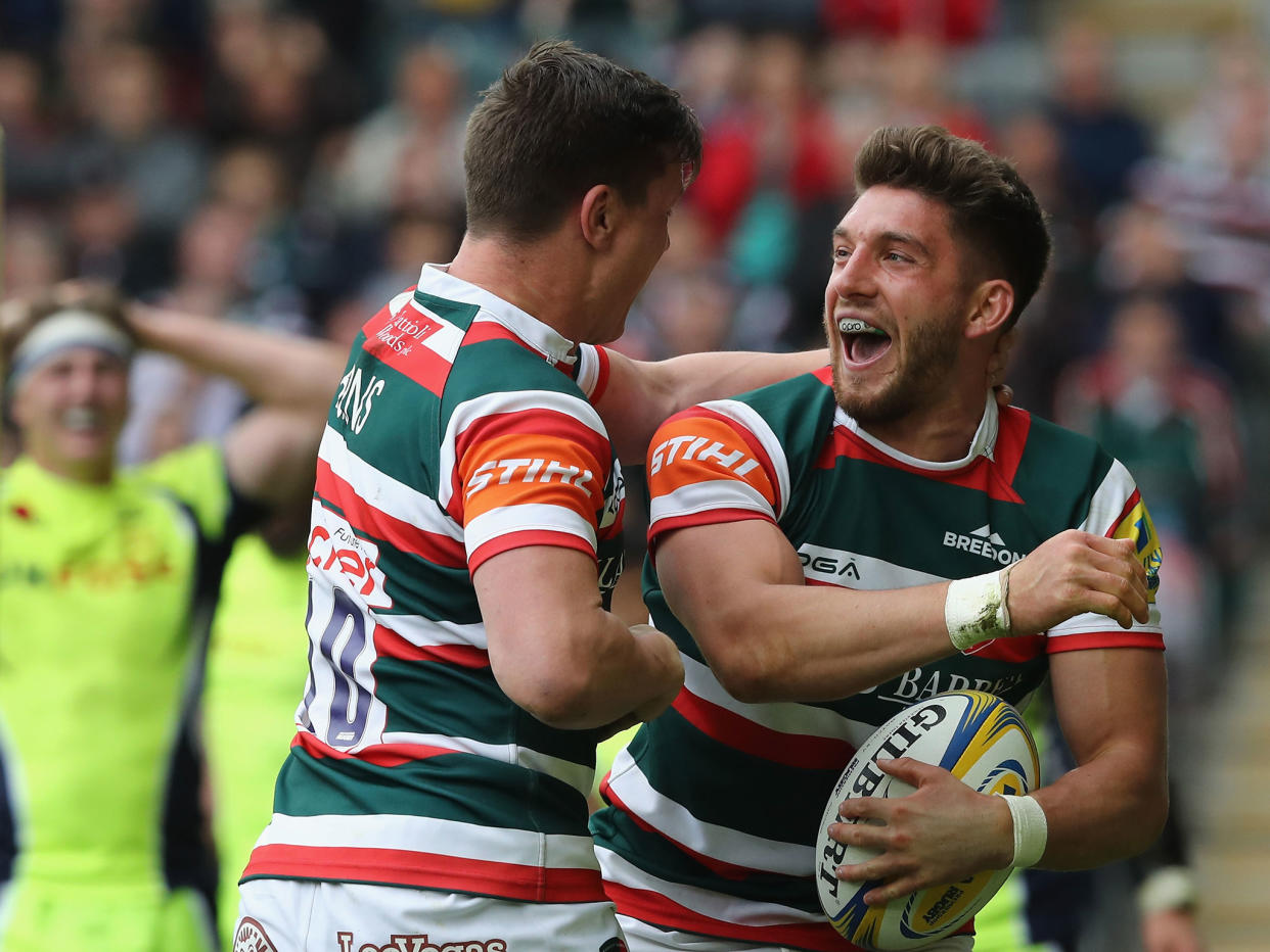 Owen Williams celebrates after scoring a try for Leicester against Sale: Getty