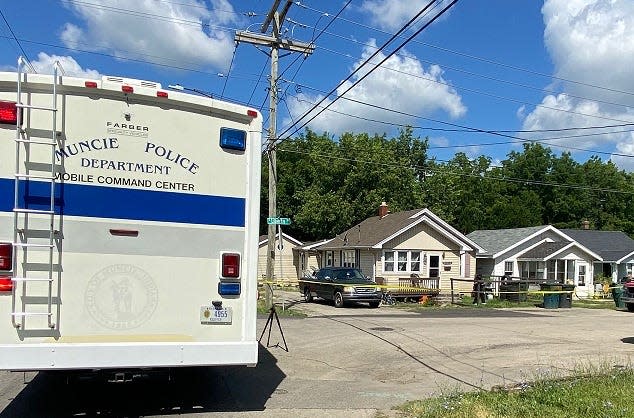 Muncie police on Wednesday investigated the slayings of two people in a home at 23rd and Liberty streets.