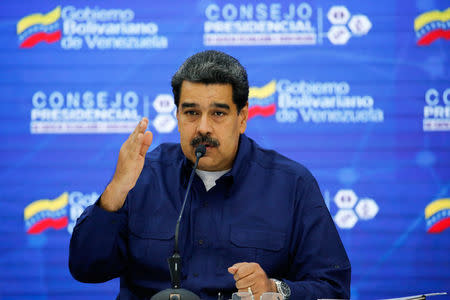 Venezuela's President Nicolas Maduro speaks during a meeting with ministers and members of the government related to the science and technology sector in Caracas, Venezuela, February 18, 2019. Miraflores Palace/Handout via REUTERS