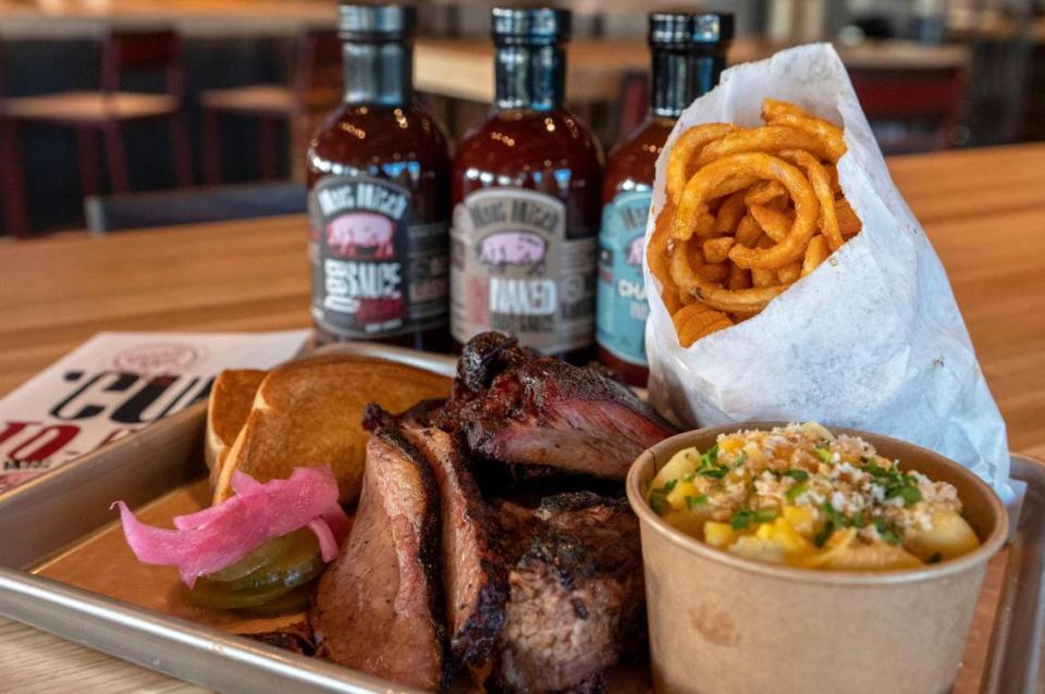 On the menu at Meat Mitch Barbecue in Leawood: brisket, burnt ends and ribs, along with bread, pickled onions, sticky curly fries and macaroni and cheese.