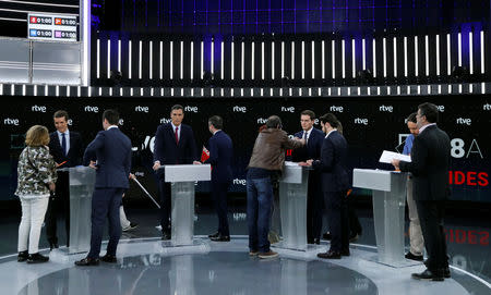 Main candidates for Spanish general elections People's Party (PP) Pablo Casado, Spanish Prime Minister and Socialist Workers' Party (PSOE) Pedro Sanchez, Ciudadanos' Albert Rivera and Unidas Podemos' Pablo Iglesias prepare for a televised debate ahead of general elections in Pozuelo de Alarcon, outside Madrid, Spain, April 22, 2019. REUTERS/Sergio Perez