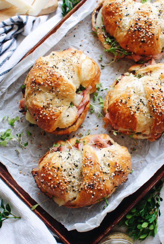 <p>Bev Cooks</p><p>These big and beautiful toasted ham and cheese croissant sandwiches are everything that makes a day start right.</p><p><strong>Get the recipe: <a href="https://bevcooks.com/2019/04/toasted-ham-and-cheese-croissant-sandwiches/" rel="nofollow noopener" target="_blank" data-ylk="slk:Toasted Ham and Cheese Croissant Sandwiches;elm:context_link;itc:0;sec:content-canvas" class="link rapid-noclick-resp"><em>Toasted Ham and Cheese Croissant Sandwiches</em></a></strong></p>