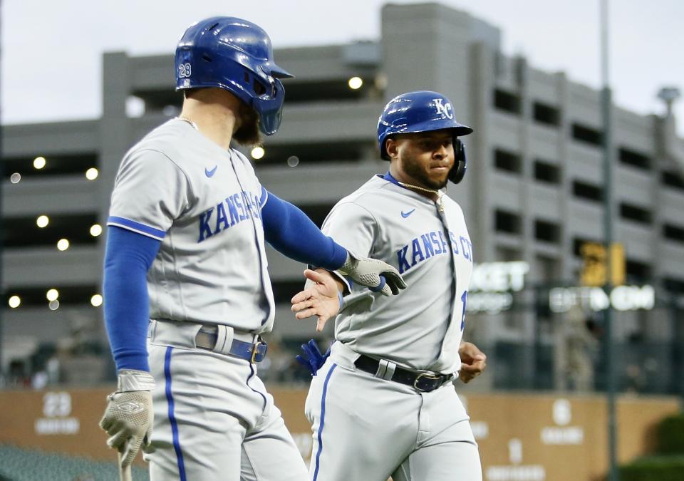 Kansas City Royals' Nelson Velazquez, right, celebrates with teammate Kyle Isbel after scoring against the Detroit Tigers during the second inning of a baseball game Tuesday, Sept. 26, 2023, in Detroit. (AP Photo/Duane Burleson)