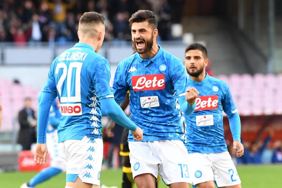 Napoli's Piotr Zielinski, left, celebrates with teammate Sebastian Luperto after scoring during the Serie A soccer match between Napoli and Frosinone, at the San Paolo stadium in Naples, Italy, Saturday, Dec. 8, 2018. (Ciro Fusco /ANSA via AP)