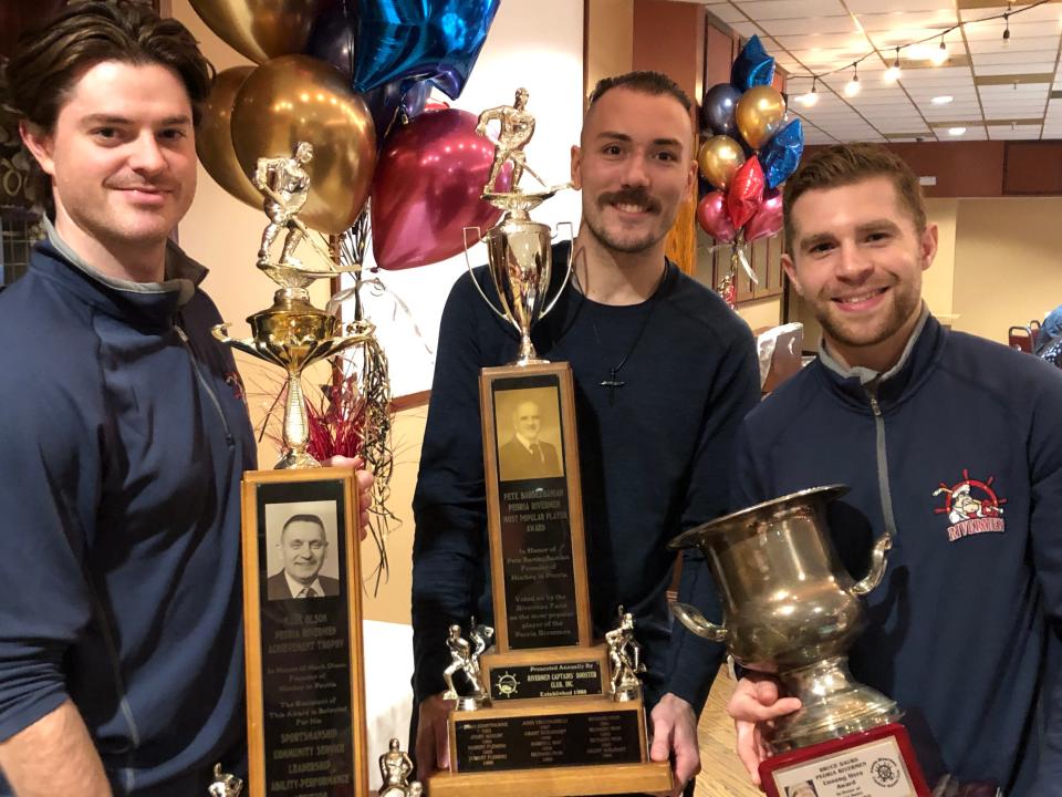 Rivermen defenseman Nick Neville (left) was named to the Marc Olson Trophy, defenseman Zach Wilkie (middle) earned the Pete BardezBanian Award and center Ben Assad won the Bruce Saurs Unsung Hero Award as the team's prestigious trophies were handed out at its annual spring banquet on Tuesday, March 28, 2023.