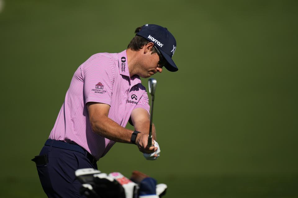 Adam Schenk hits on the practice range during a practice round in preparation for the Masters golf tournament at Augusta National Golf Club Monday, April 8, 2024, in Augusta, Ga. (AP Photo/Matt Slocum)