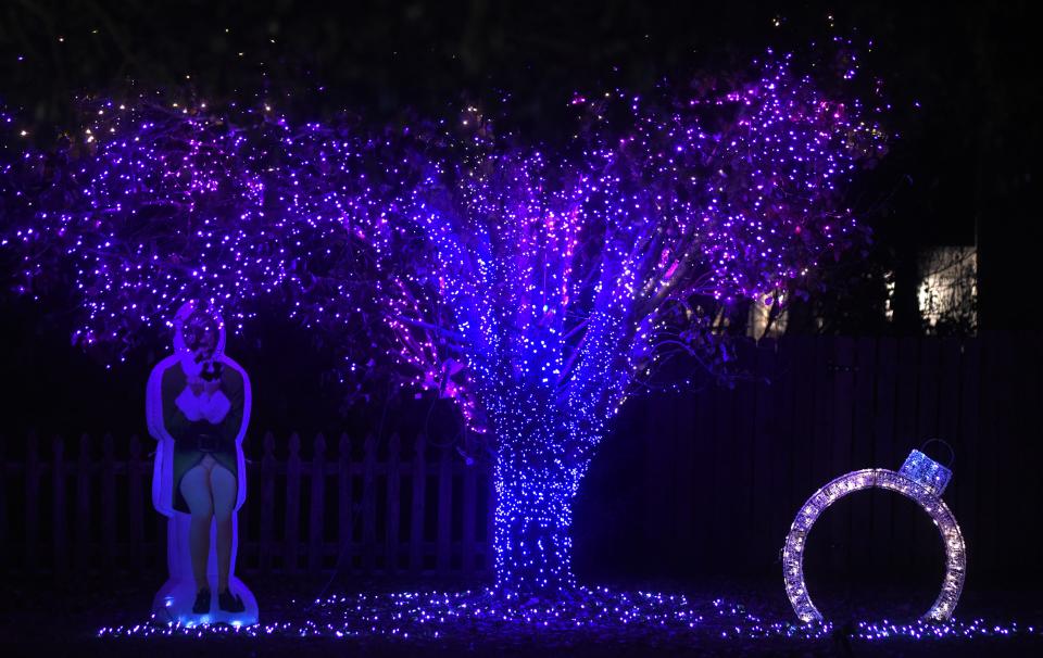 Homes are decorated for the holiday season on Buckhorn Ct. in the Murrayville area in Wilmington, N.C., Tuesday, November 30, 2021. The court in Ogden has been a popular destination for people looking at Christmas lights for past several years.    MATT BORN/STARNEWS