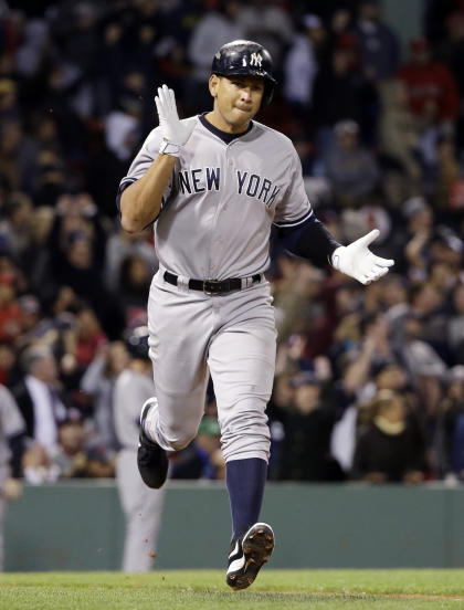 Alex Rodriguez runs to first after hitting home run No. 660. (AP)