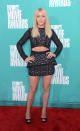 Julianne Hough showed off her taut tummy in a sexy, midriff-baring outfit Sunday at the 2012 MTV Movie Awards at the Gibson Amphitheatre in Universal City, California.. You can see even more of Hough in “Rock of Ages,” which hits the big screen June 15.