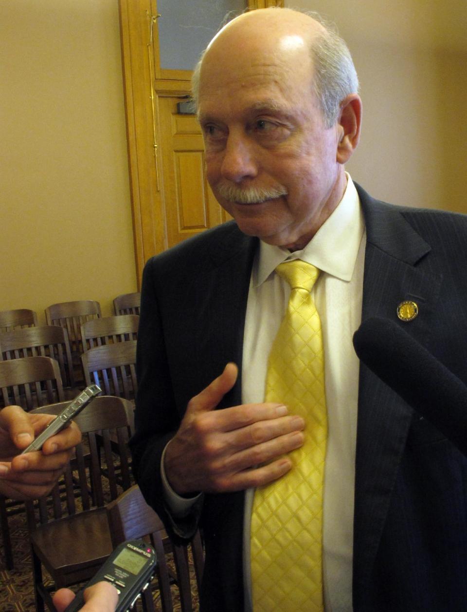 Kansas state Sen. Les Donovan, a Wichita Republican, answers questions from reporters during a break in negotiations with House members over tax cuts, Tuesday, May 15, 2012, at the Statehouse in Topeka, Kan. (AP Photo/John Hanna)