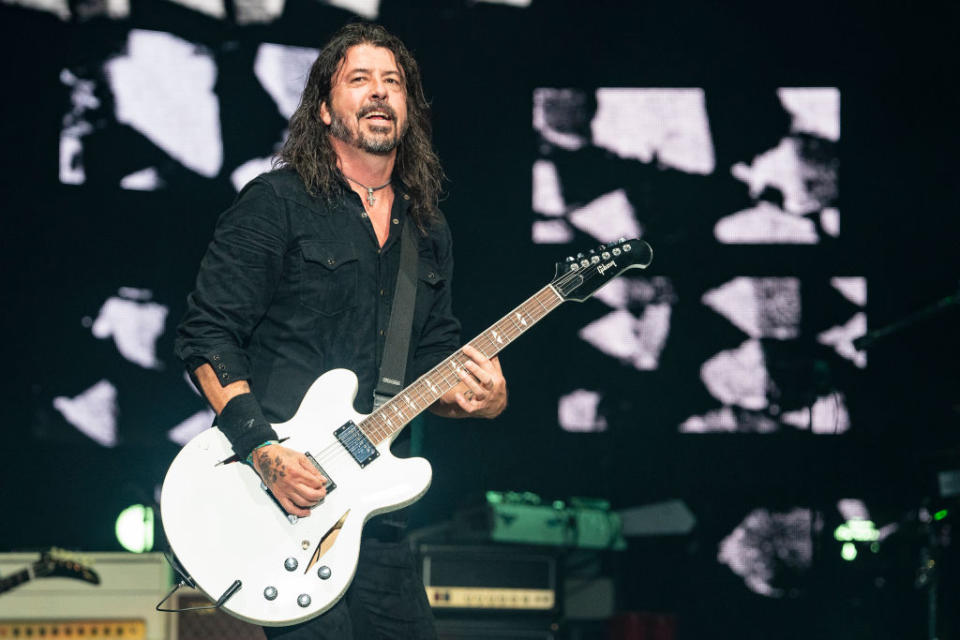 dave on stage with his guitar
