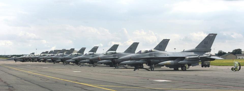 A row of Aviano-based F-16s during a visit to RAF Mildenhall in the United Kingdom. <em>USAF</em>