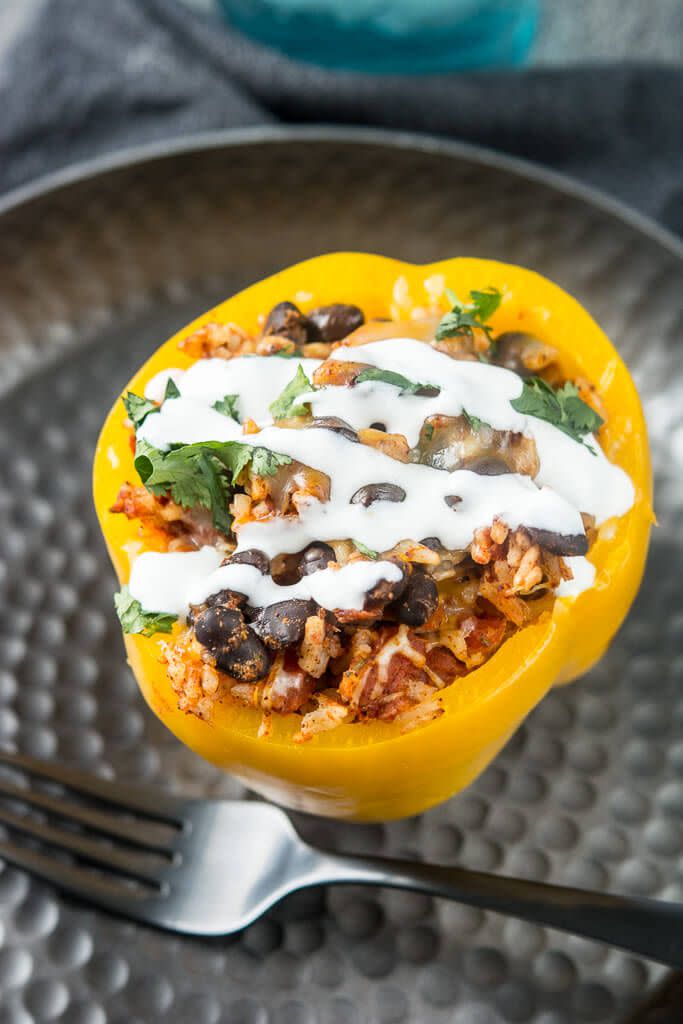 <p>These vegetarian stuffed peppers are fire.</p><p>Get the recipe from <a href="http://slowcookergourmet.net/slow-cooker-stuffed-peppers/" rel="nofollow noopener" target="_blank" data-ylk="slk:Slow-Cooker Gourmet;elm:context_link;itc:0;sec:content-canvas" class="link ">Slow-Cooker Gourmet</a>.</p>