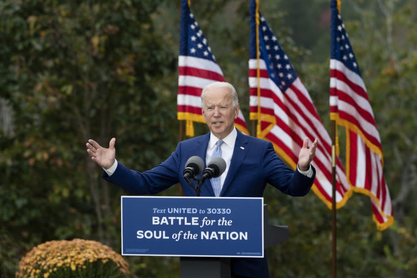 Democratic presidential candidate Joe Biden speaks at The Mountain Top Inn & Resort in Warm Springs, Georgia on October 27, 2020. - Democrat Joe Biden was campaigning in the once reliably Republican state of Georgia on Tuesday and President Donald Trump was hopscotching across the Midwest as the US election campaign entered its final week. Biden, 77, who is leading in the polls ahead of the November 3 vote, was to hold a socially distanced drive-in car rally in Atlanta, Georgia's largest city. (Photo by JIM WATSON / AFP) (Photo by JIM WATSON/AFP via Getty Images)